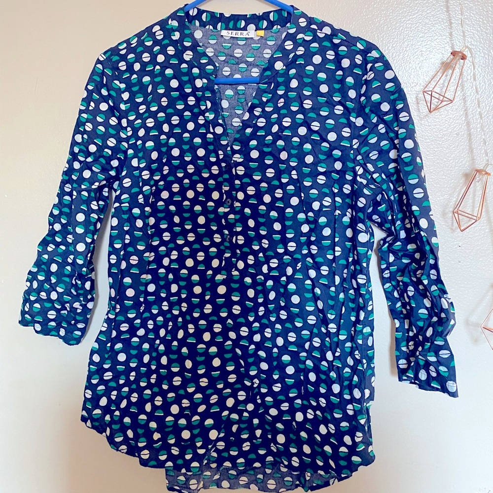 Cotton navy blouse with green dots.
